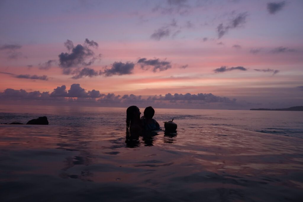Sunset over the infinity pool at NIHI Sumba